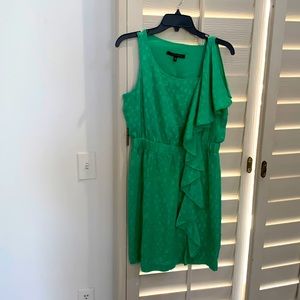 Silk textured sleeveless green ruffle dress